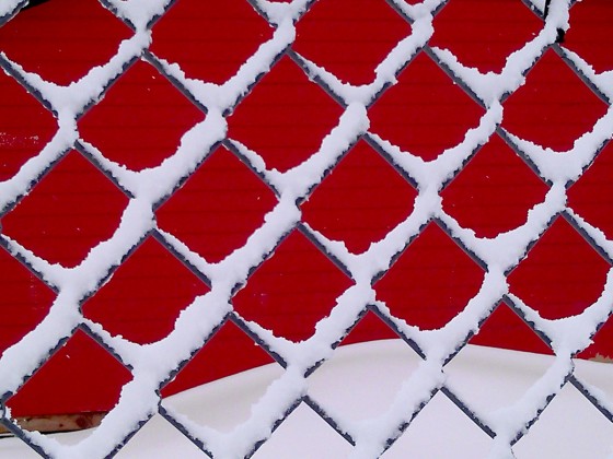 snow-fence-red-building